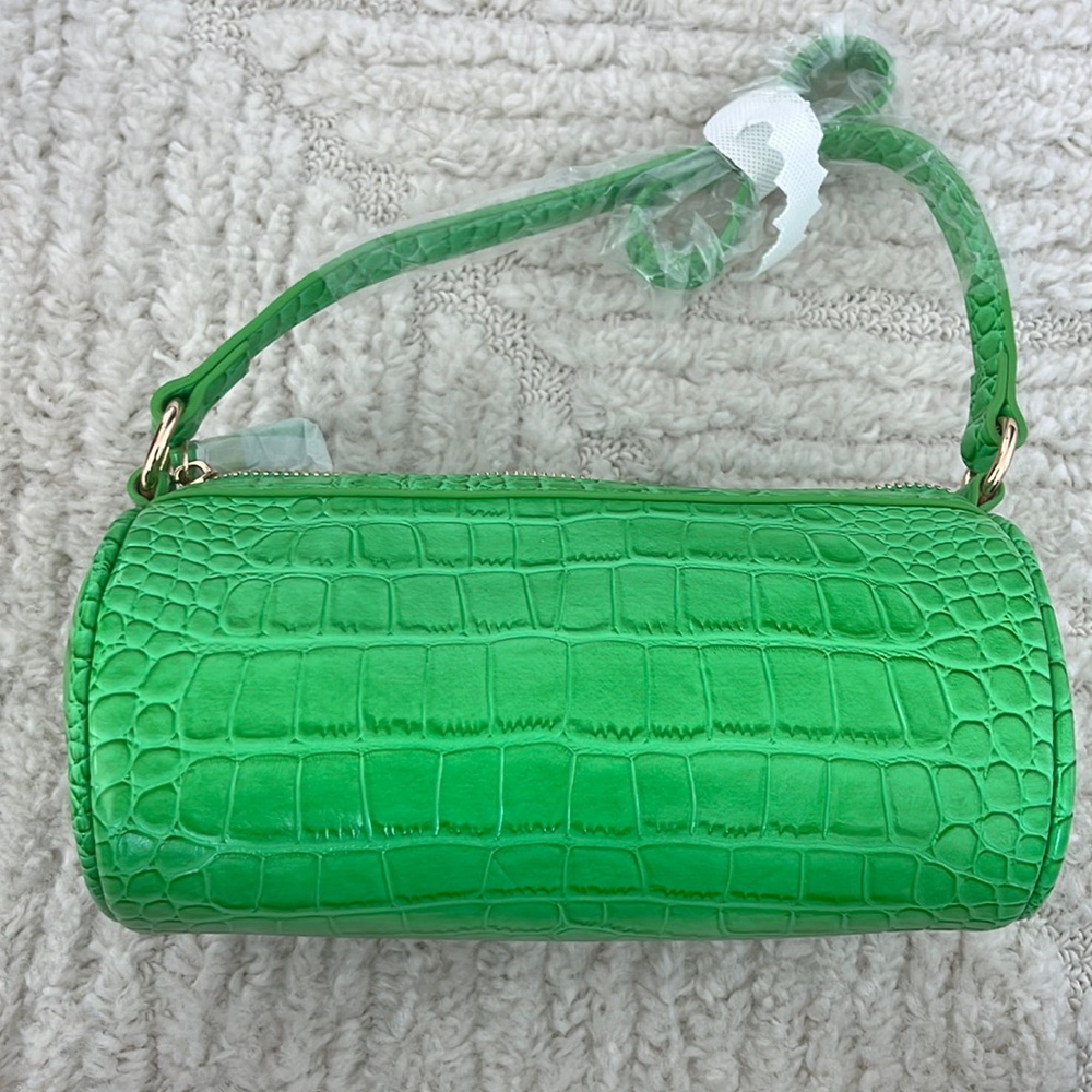 Never used shoulder cylinder green bag
